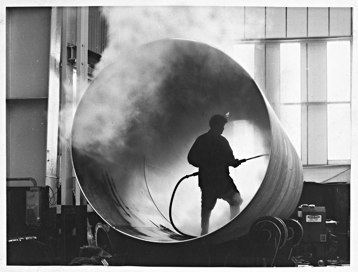June 13, 1968: Inner shell of stainless steel liquid gas storage vessel being steam cleaned at the Tipton works of Thompson Horseley division