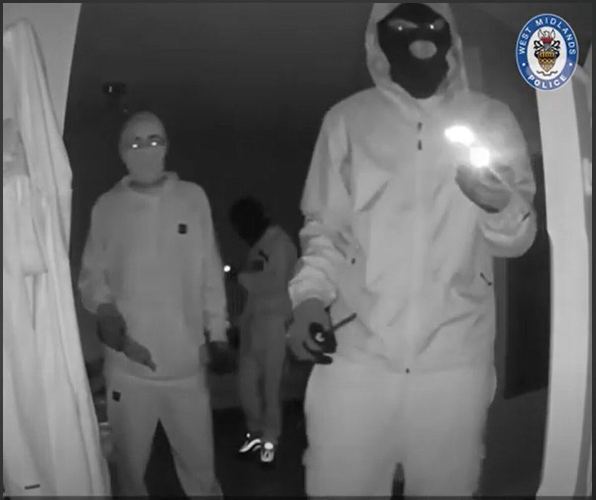 CCTV footage from a house in Solihull shows the teenagers tiptoeing through the lounge before taking keys to an Audi RS6. Photo: West Midlands Police.