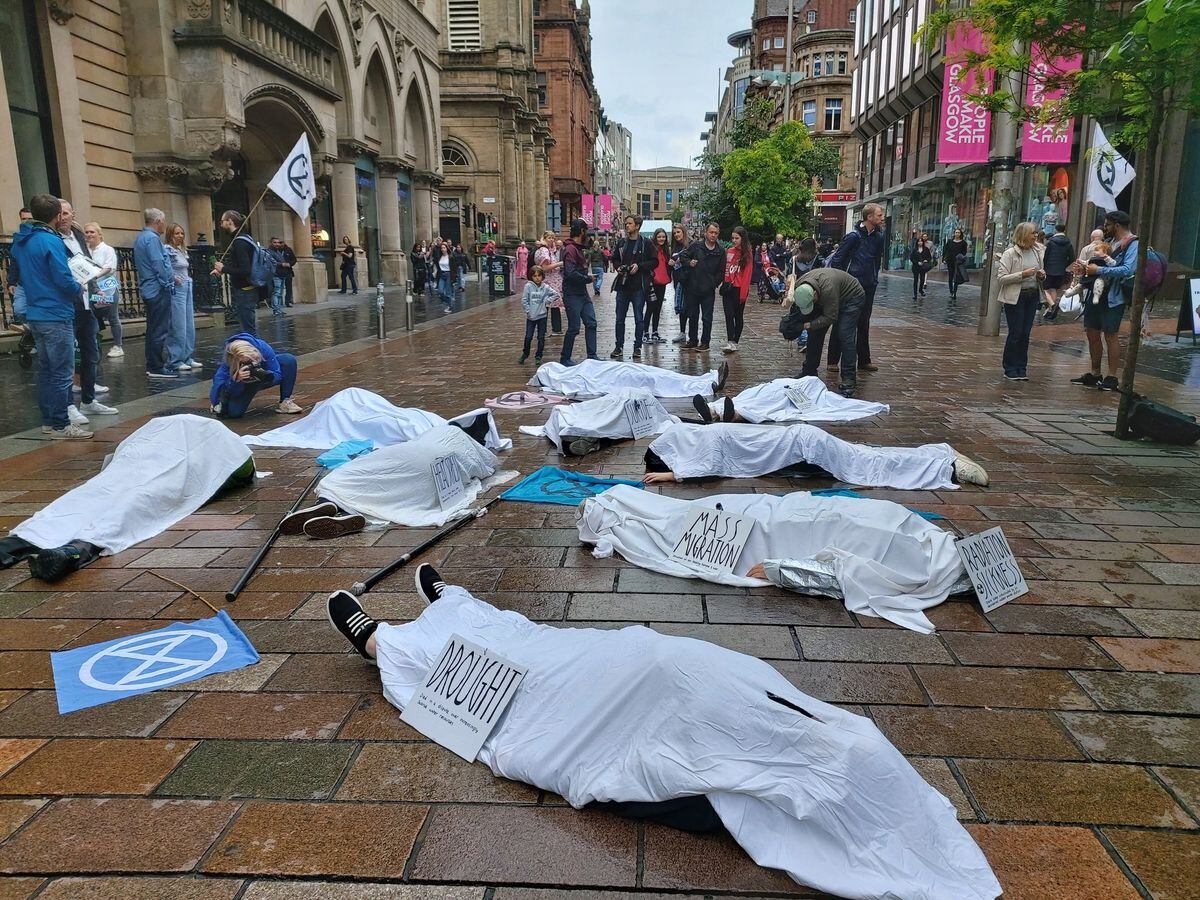 Extinction Rebellion protesters staged a 'die in' on Glasgow's Buchanan Street following the heatwave. (Extinction Rebellion Scotland)
