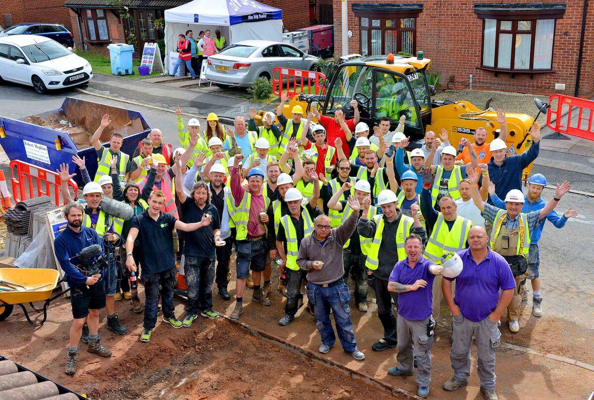 The crew outside the house in West Bromwich where DIY SOS is getting to work