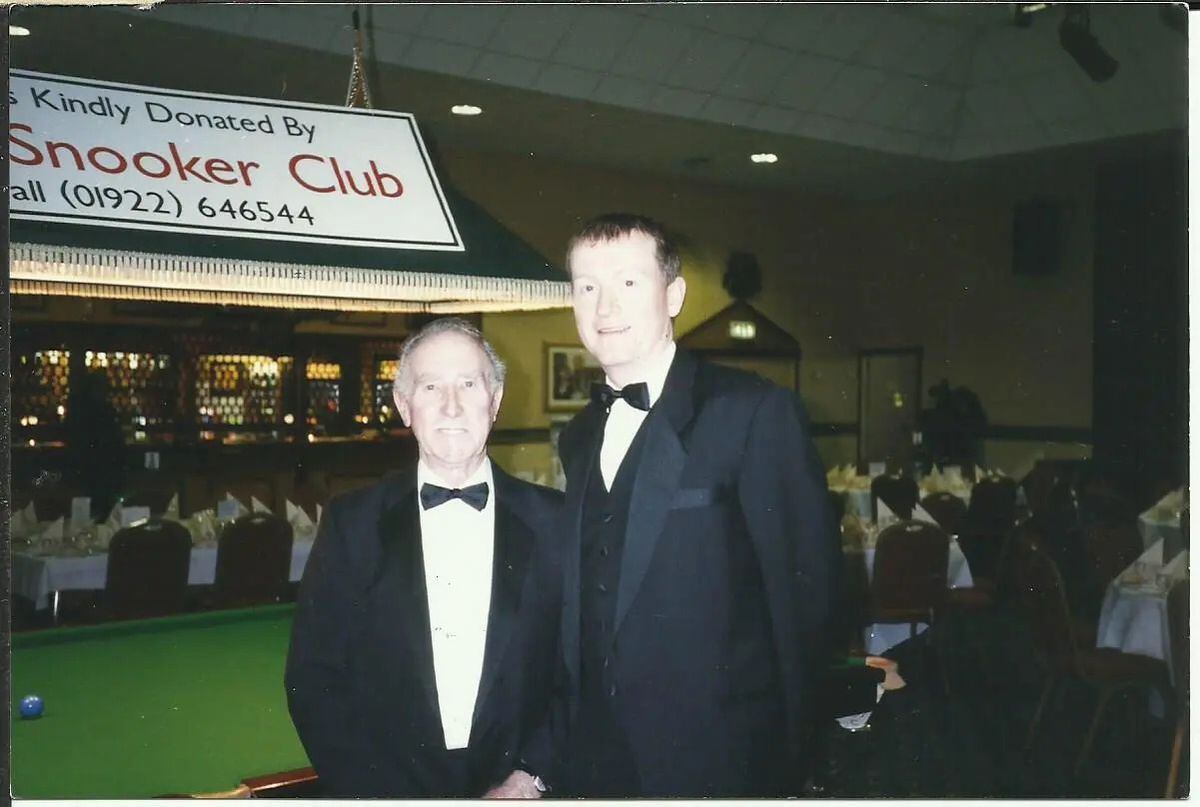 Geoffrey Harrington working as snooker referee. Pictured with Steve Davis.