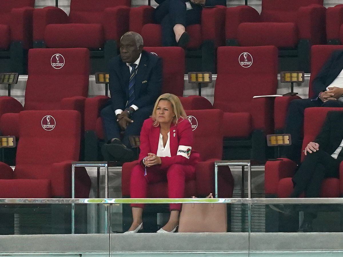 German Football Federation (DFB) President Bernd Neuendorf (right) sits alongside German Interior Minister Nancy Faeser (left) who is wearing the One Love armband as they watch from the stands, during the FIFA World Cup Group E match at the Khalifa International Stadium, Doha. Picture date: Wednesday November 23, 2022.