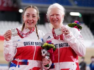 Tandem cyclists Aileen McGlynn, right, and pilot Helen Scott claimed Great Britain's maiden medal on day two of the Tokyo Games