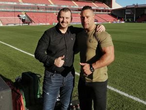 Michael Gough and Craig Timmins as they stand on the grounds on Walsall FC to promote their Sleep Out To Help Out Campaign