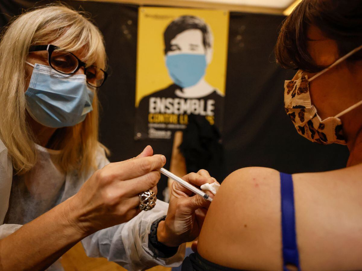 A woman receives a Pfizer Covid-19 vaccine in Strasbourg, eastern France