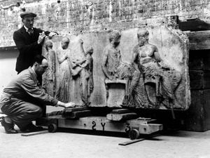 The Elgin Marbles being handled by porters in 1948 after being stored in an underground tunnel for safety during the Second World War