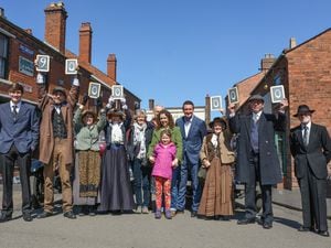 Staff at Black Country Living Museum and nine millionth customer and family
