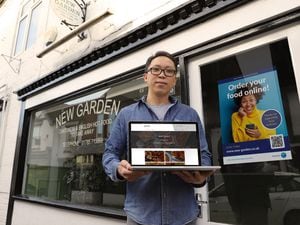 Steve Wong, of the New Garden Cantonese takeaway, with the Ourlocal website which has boosted sales