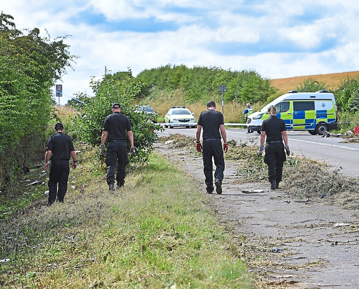 Search teams at the scene on Bridgnorth Road where Ms Jerrare was found dead 