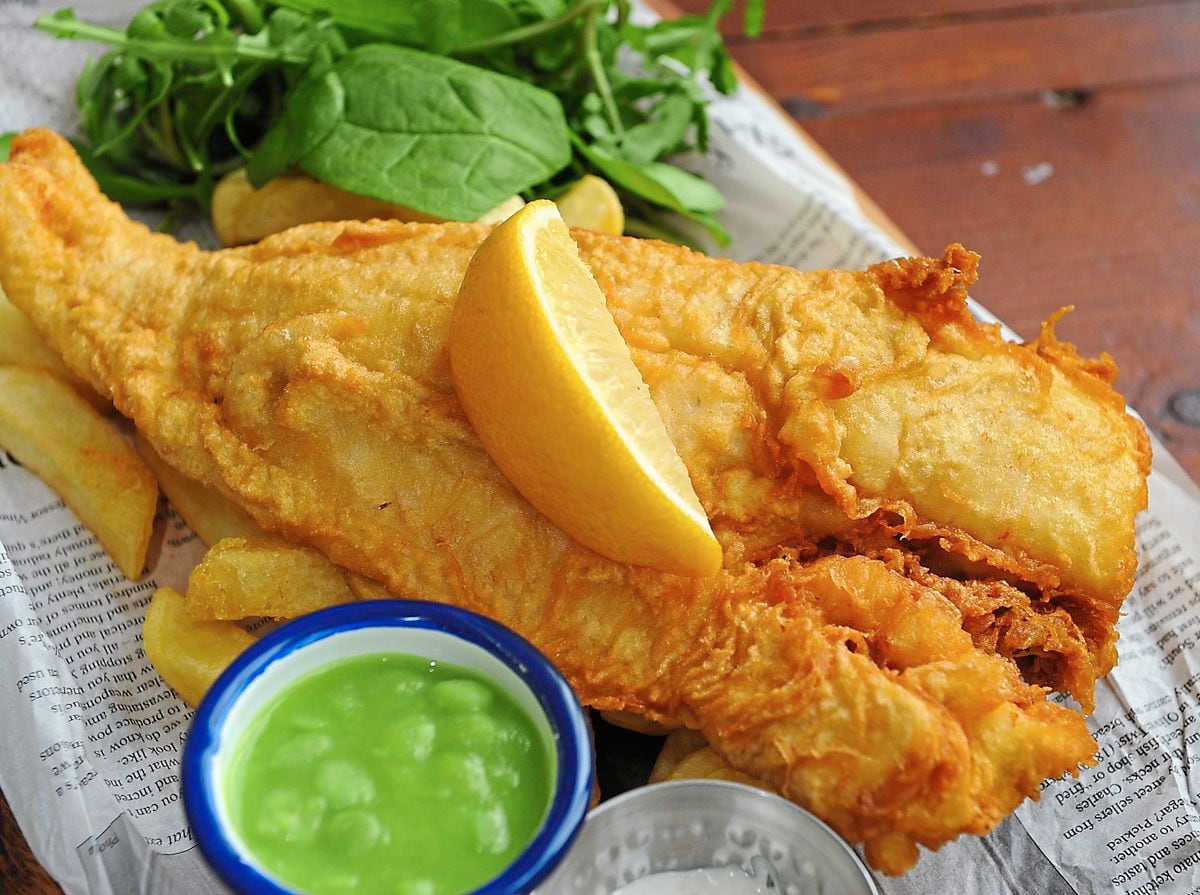 Classic fish and chips with mushy peas