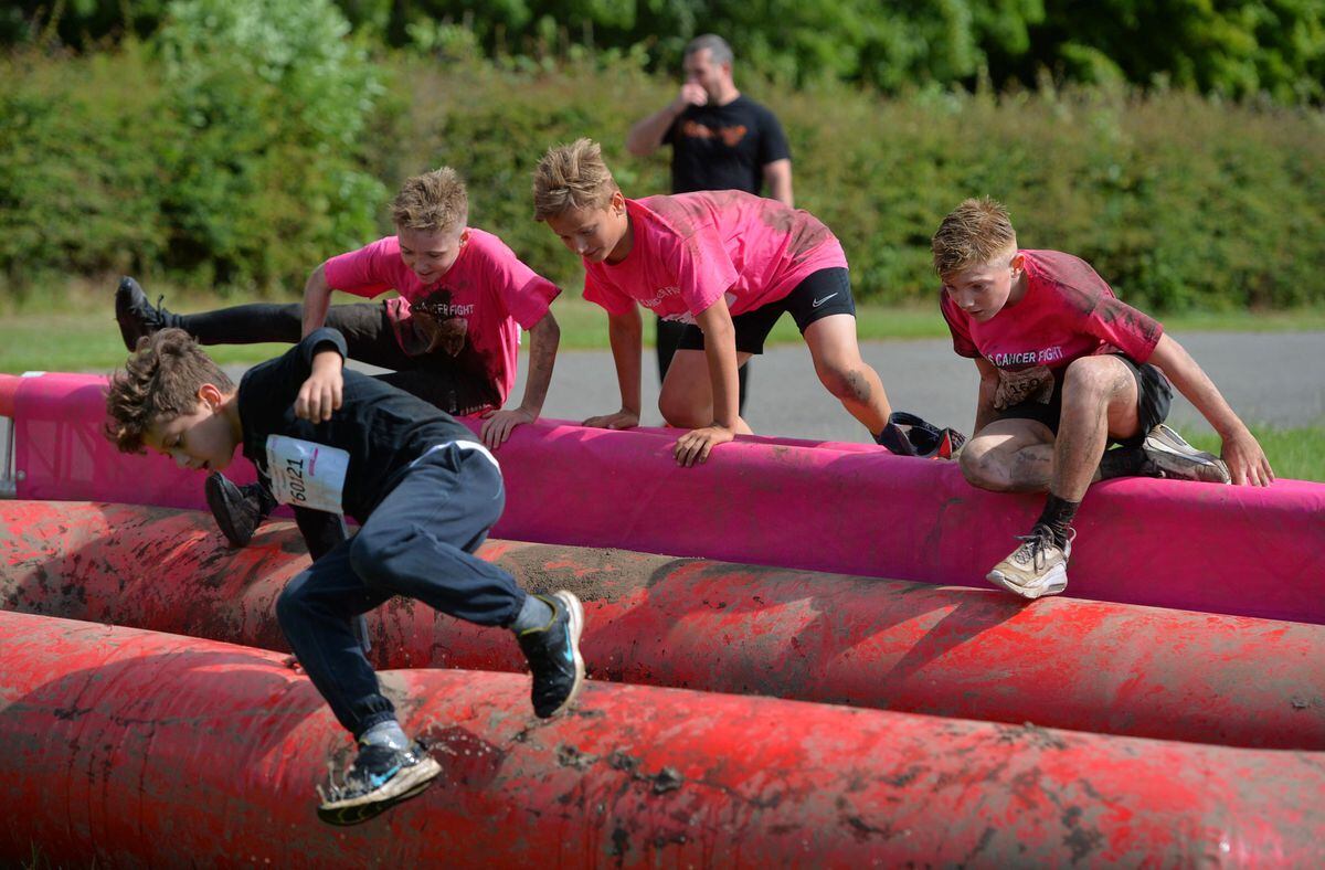 Youngsters at Race for Life Pretty Muddy 5k event at Sandwell Valley Country Park 