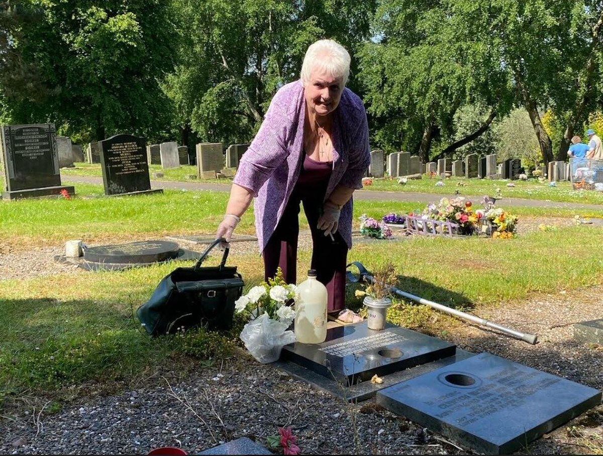 Jean Copeland tending her son’s grave 