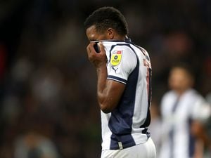 WEST BROMWICH, ENGLAND - AUGUST 17: Grady Diangana of West Bromwich Albion reacts and pulls his shirt over his face after missing a chance to score during the Sky Bet Championship between West Bromwich Albion and Cardiff City at The Hawthorns on August 17, 2022 in West Bromwich, United Kingdom. (Photo by Adam Fradgley/West Bromwich Albion FC via Getty Images).
