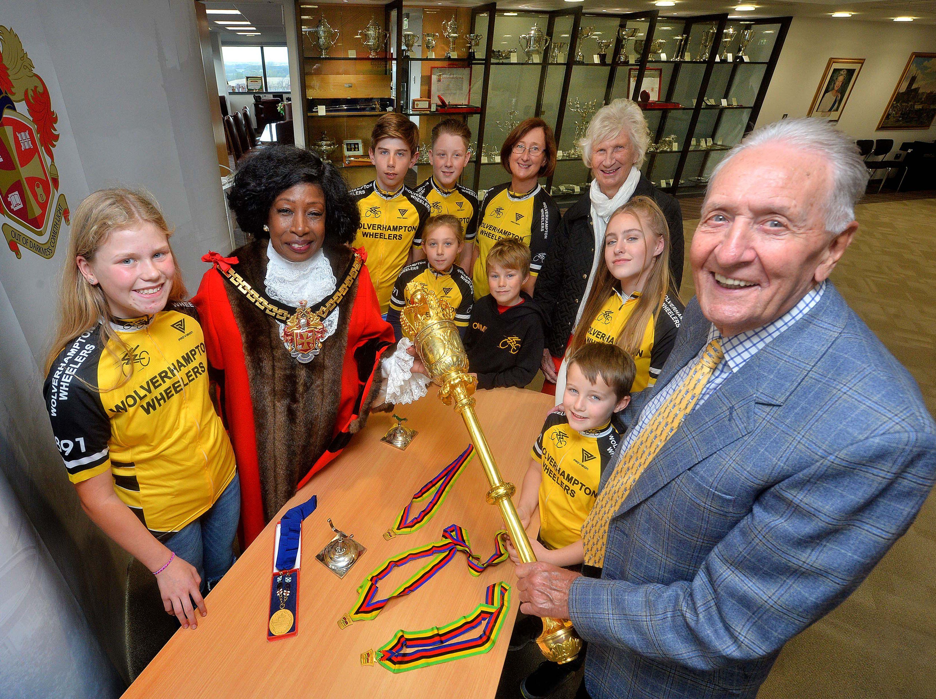 Cycling club meets Wolverhampton Mayor and dress up sporting champion in the robes