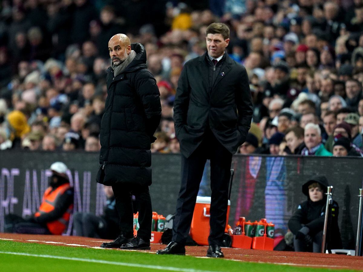 Manchester City manager Pep Guardiola alongside Aston Villa manager Steven Gerrard