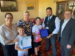 Councillor Sue Greenaway, Mayor of Dudley, with Finley Hassall and his family. The Mayor was also joined by Councillor Shaz Saleem, cabinet member for public realm