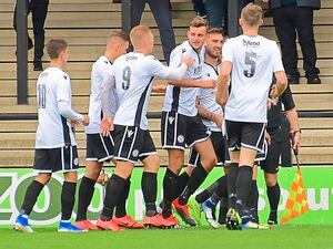 Hednesford Town celebrate as they overcame Blyth Spartans in the last round
