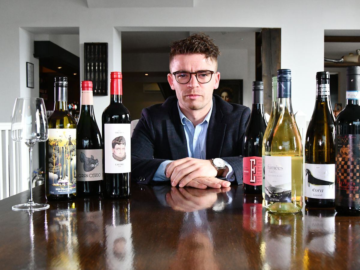  Restaurant sommelier Harry Grinonneau of the Boat Inn with a selection of wines making the shortlist