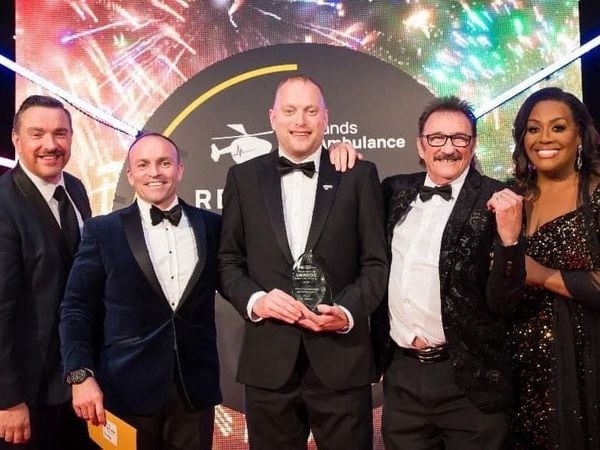 Tim Rowlands collected his award celebrating his achievements in the field. Pictured left to right: Ed James, Tim Rowlands, Paul Chuckle and Alison Hammond