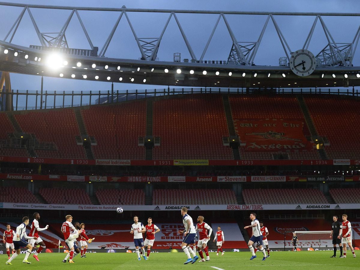 Arsenal take on Tottenham at an empty Emirates Stadium