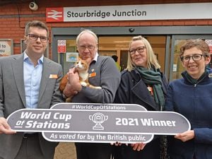 George checks out the new sign with Jonny Wiseman, Ian Tomlinson, Simone Carter and Catherine Murphy at Stourbridge Junction