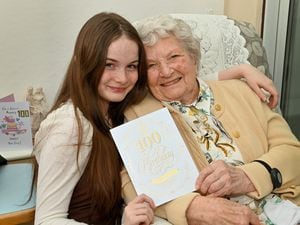 DUDLEY COPYRIGHT MNA MEDIA TIM THURSFIELD 05/04/23.Joyce Harwood from Kingswinford celebrates her 100th birthday with great, great, great niece Adella Boulton, aged 14..