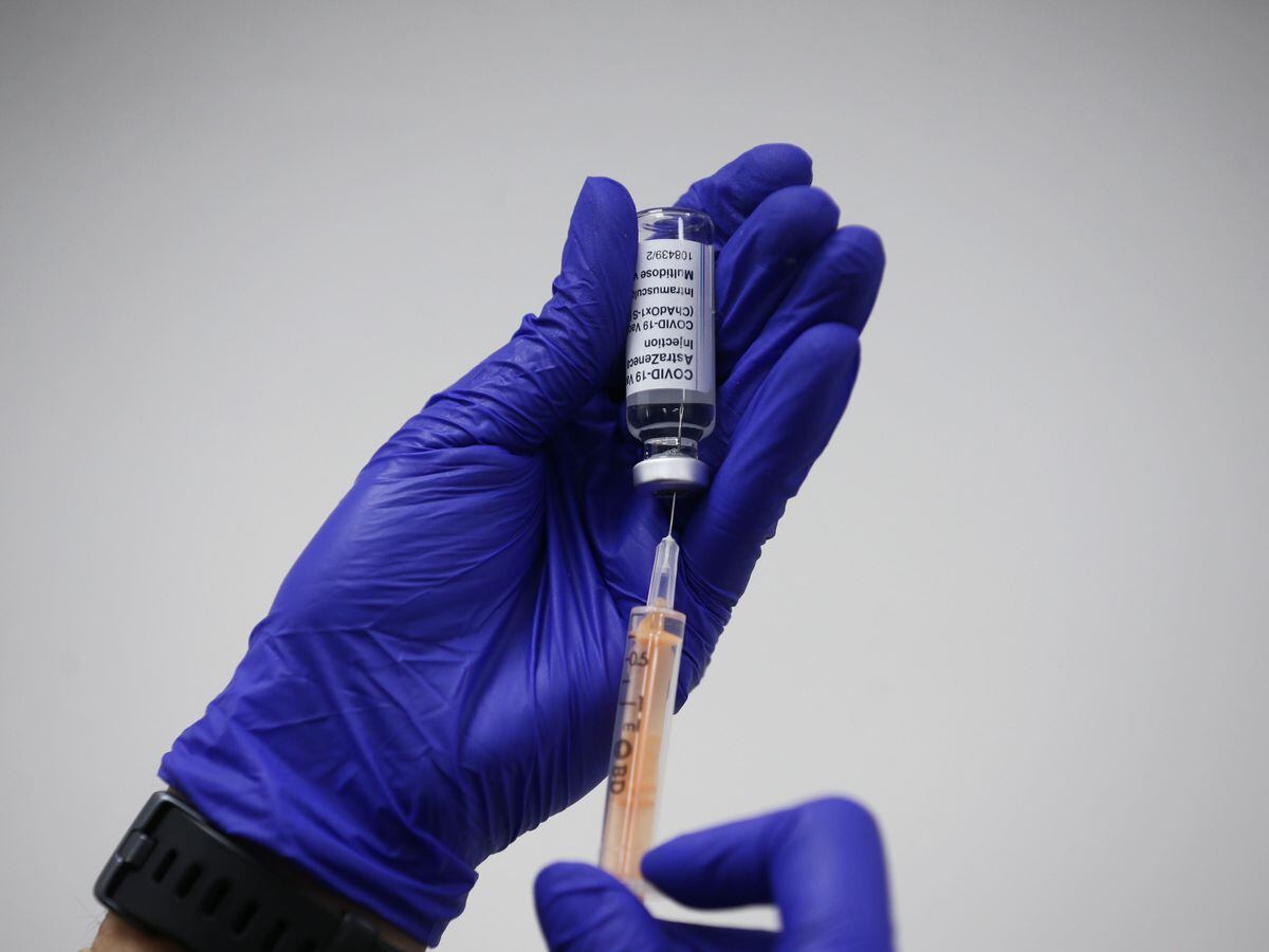 A dose of the Oxford/AstraZeneca coronavirus vaccine is prepared, at Copes Pharmacy (PA)