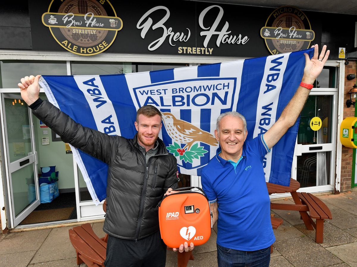 Brewhouse owner and Albion fan Colin Stephens with Chris Brunt 