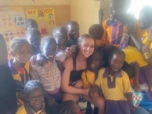 Ellie with schoolchildren in The Gambia