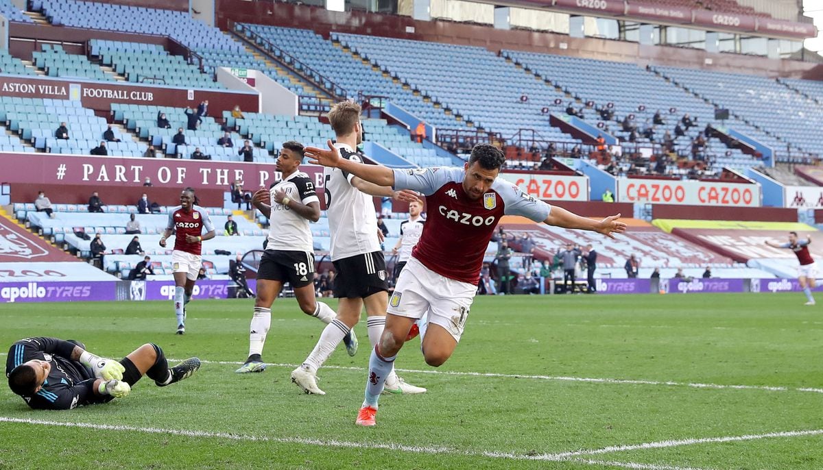 Aston Villa's Trezeguet (right) celebrates scoring their side's second goal of the game during the Premier League match at Villa Park, Birmingham. Picture date: Sunday April 4, 2021. PA Photo. See PA story SOCCER Villa. Photo credit should read: Richard Heathcote/PA Wire.