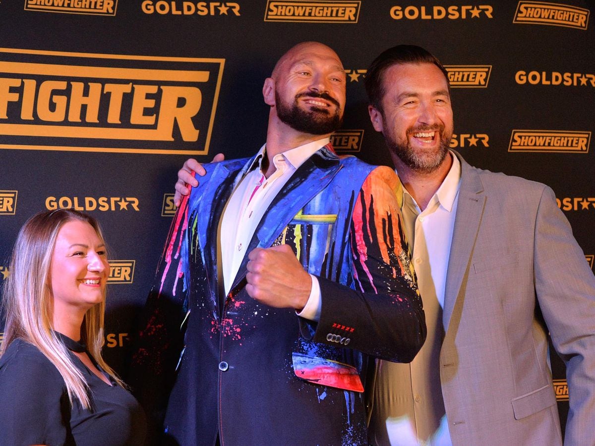 Tyson Fury shares a laugh with Peter Davies and Danielle Thorpe from Wednesfield
