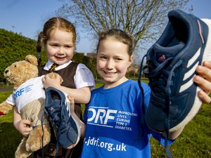 Millie Baynham-Hughes poses with her sister Lola, who has type 1 diabetes.