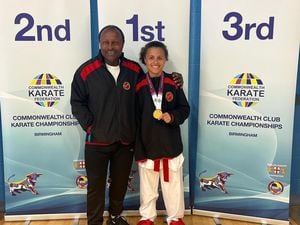 Imogen Campbell taking Gold in The Commonwealth Club Championships with coach Paul Campbell