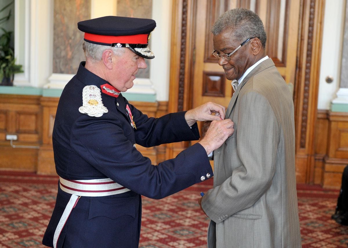 BEM awards being presented at Birmingham Council House by West Midlands Lord-Lieutenant John Crabtree OBE. Bishop Stanford Fairin from Smethwick