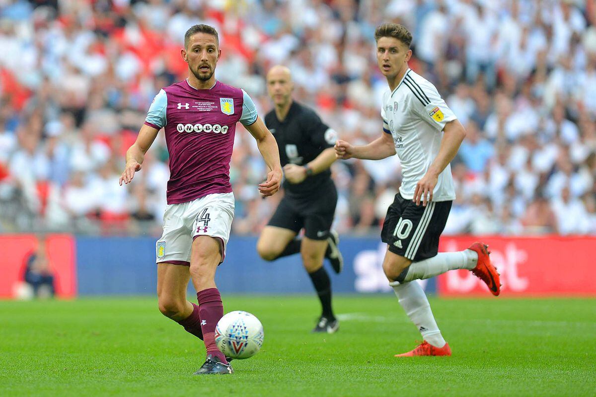 Conor Hourihane says that Villa's play-off final defeat is still hurting the club.