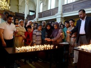 Interfaith candel light vigil held at St John's Church in Wolverhampton in memory of the Manchester attack.  Members of mosques from Wolverhampton at the vigil.
