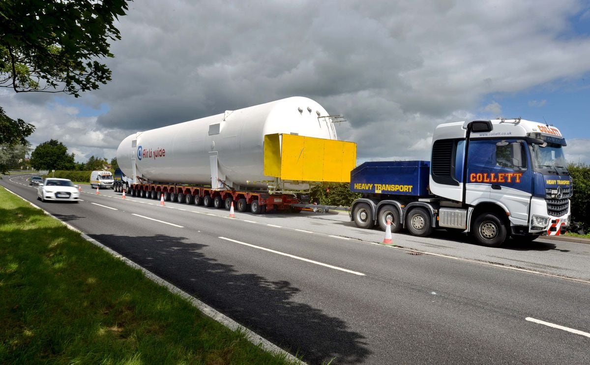 The oxygen tank, which dwarfs a passing car, pulled up in a lay by on the A34 between Stafford and Stone
