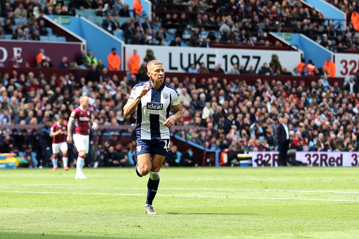 Dwight Gayle of West Bromwich Albion celebrates after scoring a goal to make it 0-1.