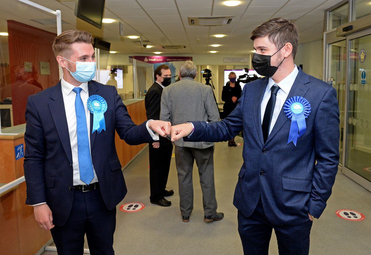 Joshua Whitehouse and Brad Allen celebrate a successful result for the Conservatives in Walsall
