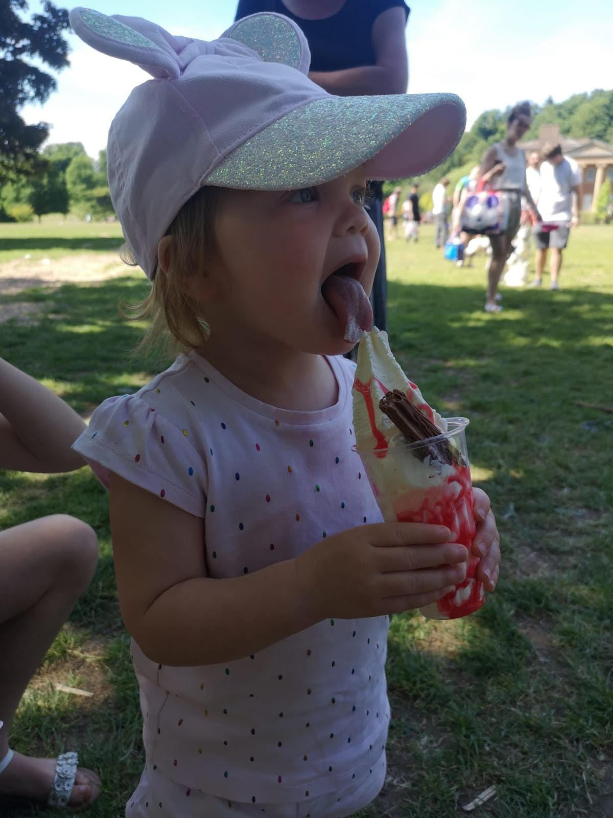 Two-year-old Lola Ava Hingley enjoyed an ice cream while she was out with her mother Sara during a picnic at Himley Park