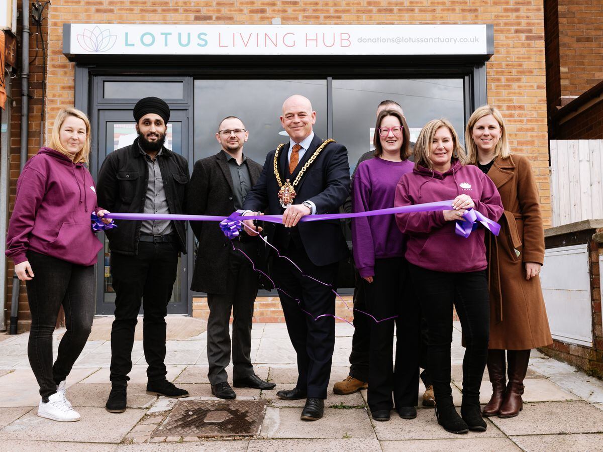 Mayor of Wolverhampton Greg Brackenridge opens the Lotus Living Hub shop in Bilston.
