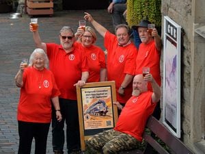 Bridgnorth CAMRA member getting ready for their beer festival to begin earlier this month