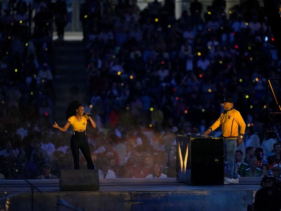 Goldie and Beverley Knight perform on stage during the Commonwealth Games closing ceremony. Photo: Tim Goode/PA Wire