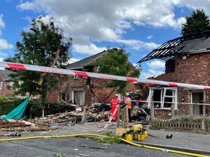Emergency services at the scene in Dulwich Road, Kingstanding, the day after the house explosion. Photo: Richard Vernalls/PA Wire