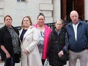 From left, Martina Dillon, wife of Seamus Dillon, sisters Lynda, Isobel, and Donna McManus, daughter’s James McManus, with Peter McCarthy outside the Royal Courts of Justice in Belfast