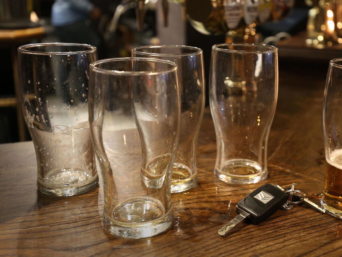 Beer glasses in a pub in London (Philip Toscano/PA)