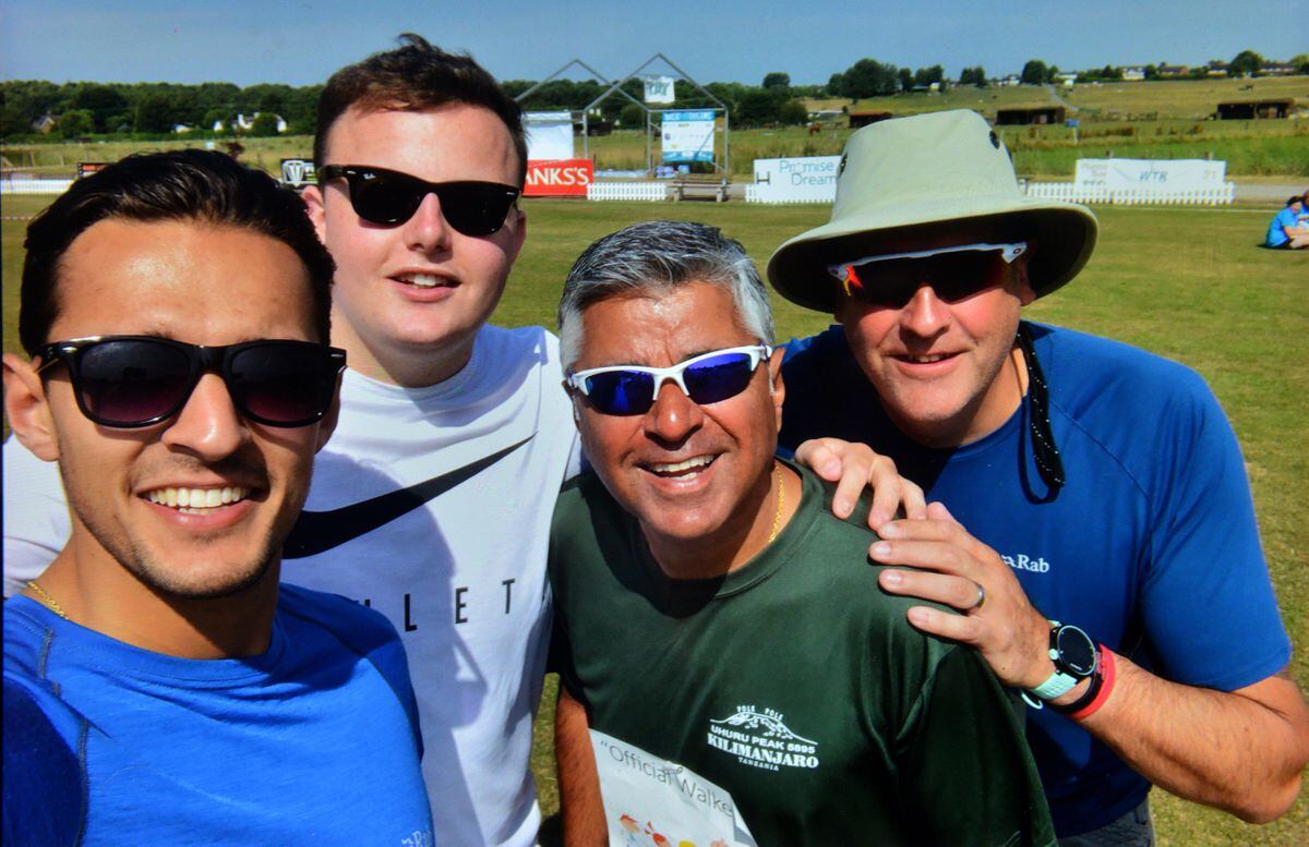 Suresh with son Arran Bawa, and friends Tom Hatton and Neil Taylor, during the 2016 sponsored walk