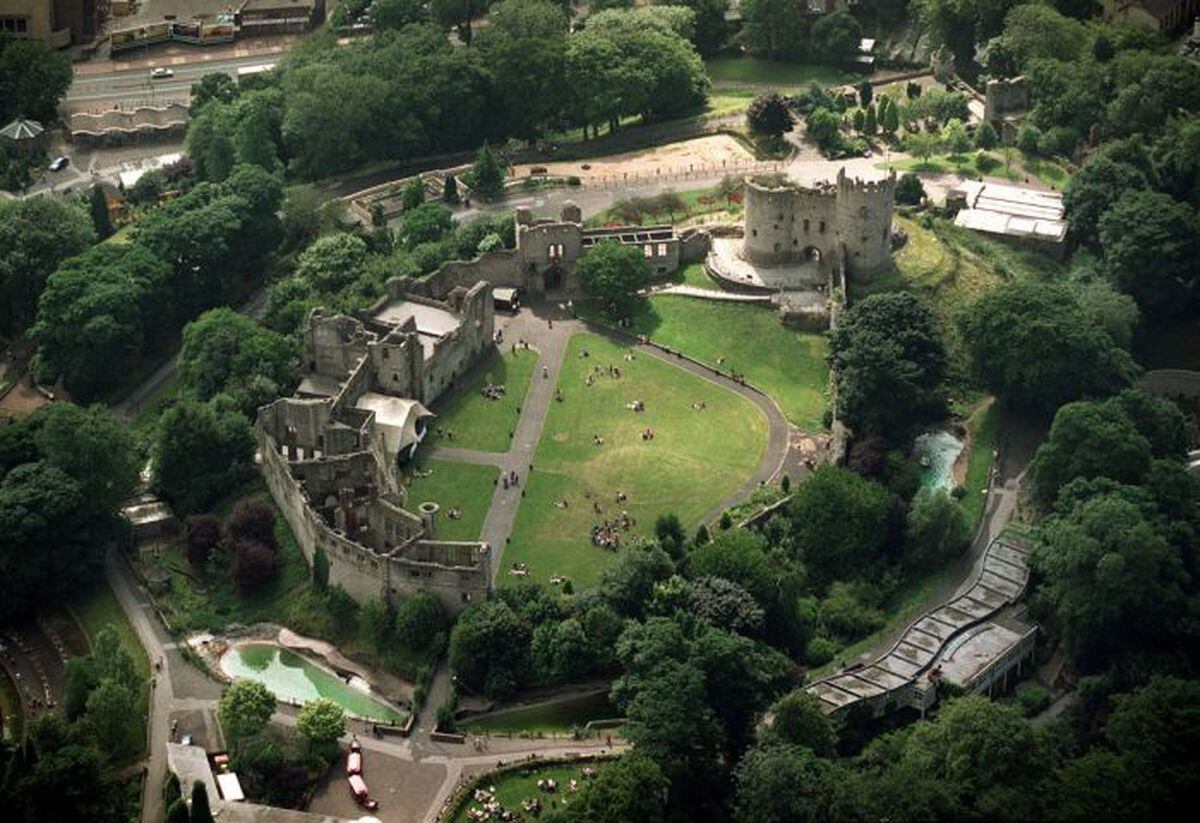 An aerial view of Dudley Castle with Dudley Zoo around the perimeter