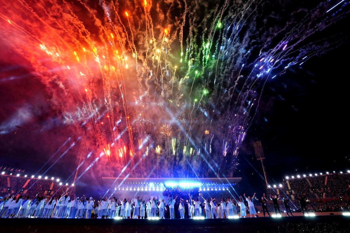 Performers and spectators look on as fireworks are set off during the opening ceremony of the Birmingham 2022 Commonwealth Games at Alexander Stadium. Photo: Davies Davies/PA Wire.