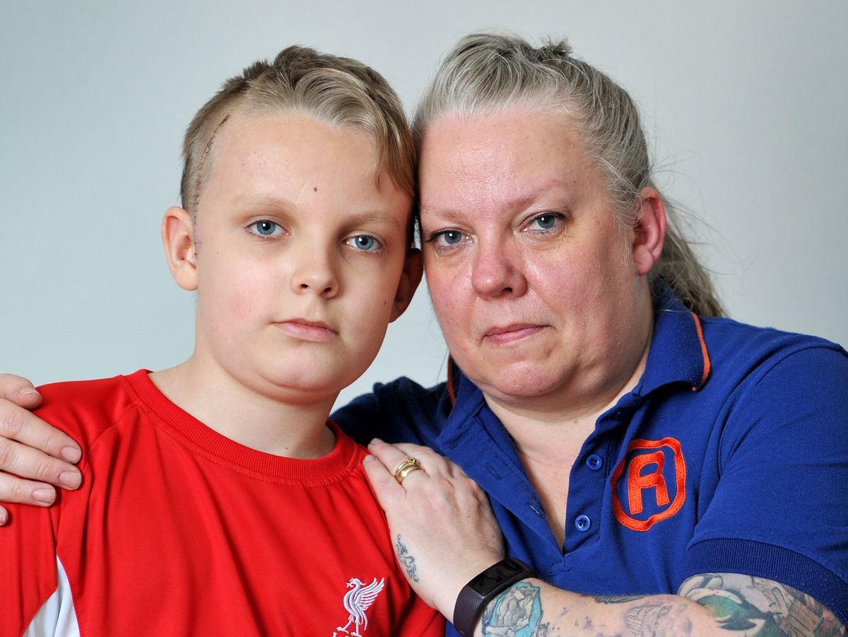 Teenager Archie Quilter, with mum Helen, suffered a fractured skull when he was hit by a car outside his school